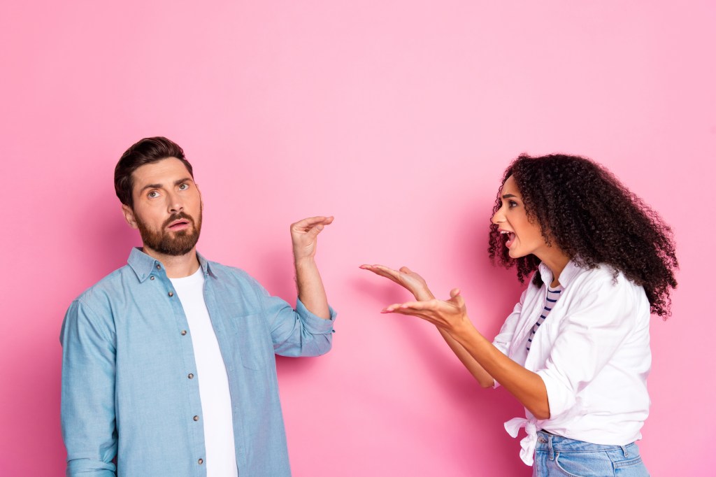 A young couple who discussed a pink background